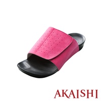 粉紅色絨面鞋面帶有透氣孔，配備魔鬼氈可調整鬆緊，黑色防滑鞋底，整體為舒適的室內拖鞋款式。