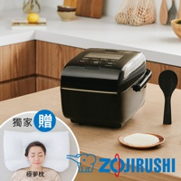 黑色炎舞壓力IH電子鍋(NW-LAF10)，搭配黑色飯勺與一小碟白米，置於木質桌面。