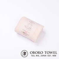 淡粉色三倍吸水專顏洗臉毛巾，材質柔軟，表面有毛圈，包裝紙上印有日文文字、臉部插畫及「FOR SKINCARE」字樣。