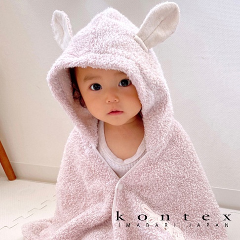 粉色厚感毛圈浴巾，帶有兔耳朵連帽，適合嬰幼兒，材質柔軟親膚。
