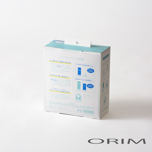 今治吹髮專用吸水桑拿風頭巾產品包裝盒，盒身印有日文說明及產品特點圖示，包含吸水性、乾燥速度及形狀介紹，並標示材質為Cotton 100%。