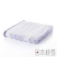 一條折疊的今治水泡泡毛巾，主體為白色，帶有淺紫色圓點圖案及紫色滾邊，材質柔軟，質地輕盈。