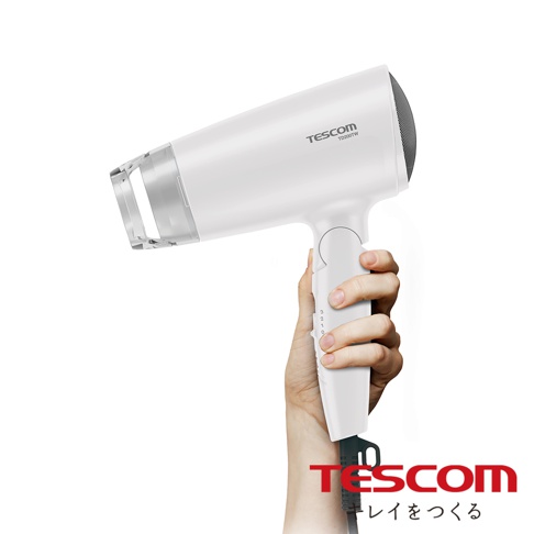 TESCOM TD200TW 吹風機，白色機身，由手持握，可見風量調整開關。