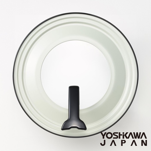 頂視圖顯示一個圓形、淺綠色、可立式強化玻璃鍋蓋，邊緣有黑色包邊。中央有一個黑色、符合人體工學的提手，設計成可方便站立。