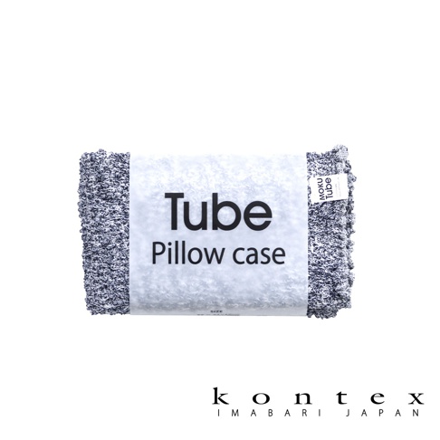 MOKU TUBE 高彈性透氣枕套，織紋獨特，有深藍與白色交織的配色，觸感柔軟，包裝上有產品名稱與品牌標籤。