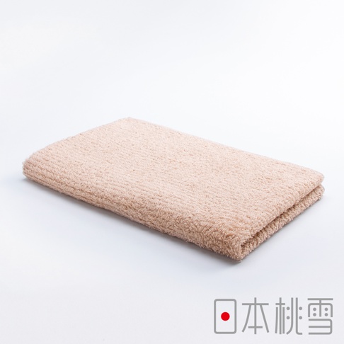今治細絨毛巾，淺褐色，觸感柔軟，織紋細膩，對折後平鋪於白色背景上。
