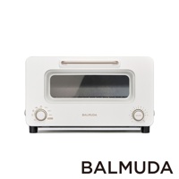 The Toaster Pro 蒸氣烤麵包機專業版 K11C-SE 呈現簡約的白色金屬外觀，配備銀色提把和兩個控制旋鈕。頂部有玻璃觀察窗，可看到內部烤網。