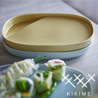 兩個疊放的波佐見燒橢圓主菜盤，上方盤子為淺黃色，下方盤子為淺藍色，盤中擺放著春捲。