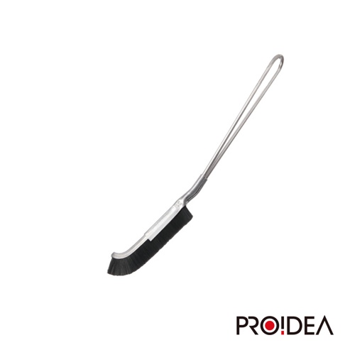 J型隙縫刷，具有金屬彎曲手柄與黑色刷毛，適合清潔狹窄縫隙。