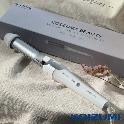KOIZUMI Beauty 可調式電捲棒 KHR-G070/WE，配備銀色加熱滾筒和白色手柄，旁邊是印有產品資訊的包裝盒。