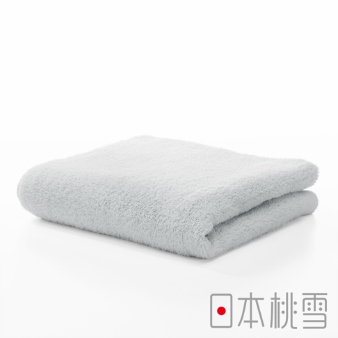 今治超長棉毛巾，淺灰色，材質柔軟，以簡約的風格對折展示，呈現其蓬鬆的質感。