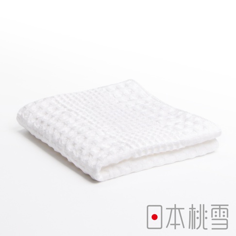 一條白色今治鬆餅毛巾，織有格子紋理，柔軟蓬鬆，適合日常使用。