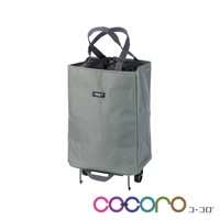 AVERY 簡約輕巧折疊購物車，灰色帆布材質，配有兩個灰色提把和兩個黑色輪子，正面有一個黑色品牌標籤。