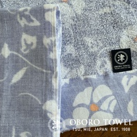 朧染和紋款待之心紗布毛巾，標有津OBORO TSU, MIE, JAPAN EST. 1908 字樣