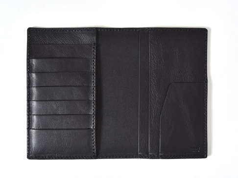 職人手作皮革多用途收納長夾 (KB-5)，黑色皮革長夾展開，左側有六個直式卡夾，右側有兩個直式內袋，材質為真皮，縫線工整。