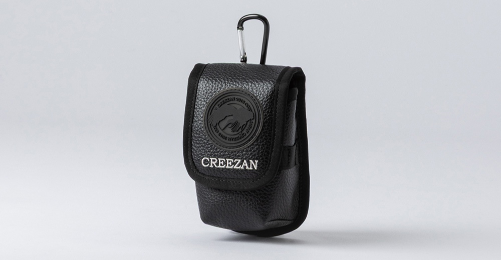 黑色皮革材質高爾夫球收納腰包，附有掛鉤，包身有「CREEZAN」字樣及品牌標誌。