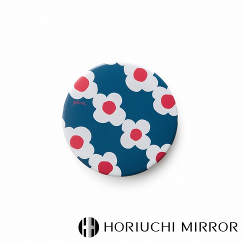 NAPURE plune. 隨身口袋小圓鏡，圓形設計，深藍色背景印有白色花朵圖案，花朵中心為紅色圓點，鏡面材質。