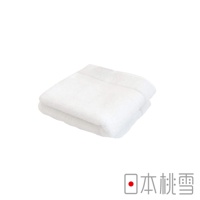 一張白色今治匹馬棉方巾，對折後呈現柔軟的織物紋理，邊緣有細緻的縫線。