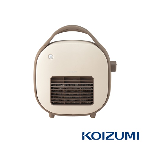 米色與淺棕色調的迷你陶瓷電暖器，頂部有可提式把手，正面中央為棕色網狀出風口，上方有圓形感應器及品牌 Logo。