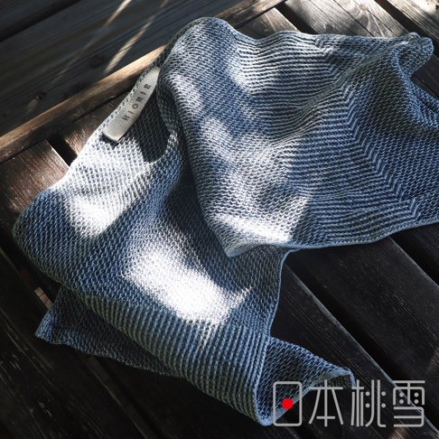 SEK抗菌防臭檜木鬆餅紋毛巾，質地蓬鬆柔軟，日本製造，有品牌標籤。