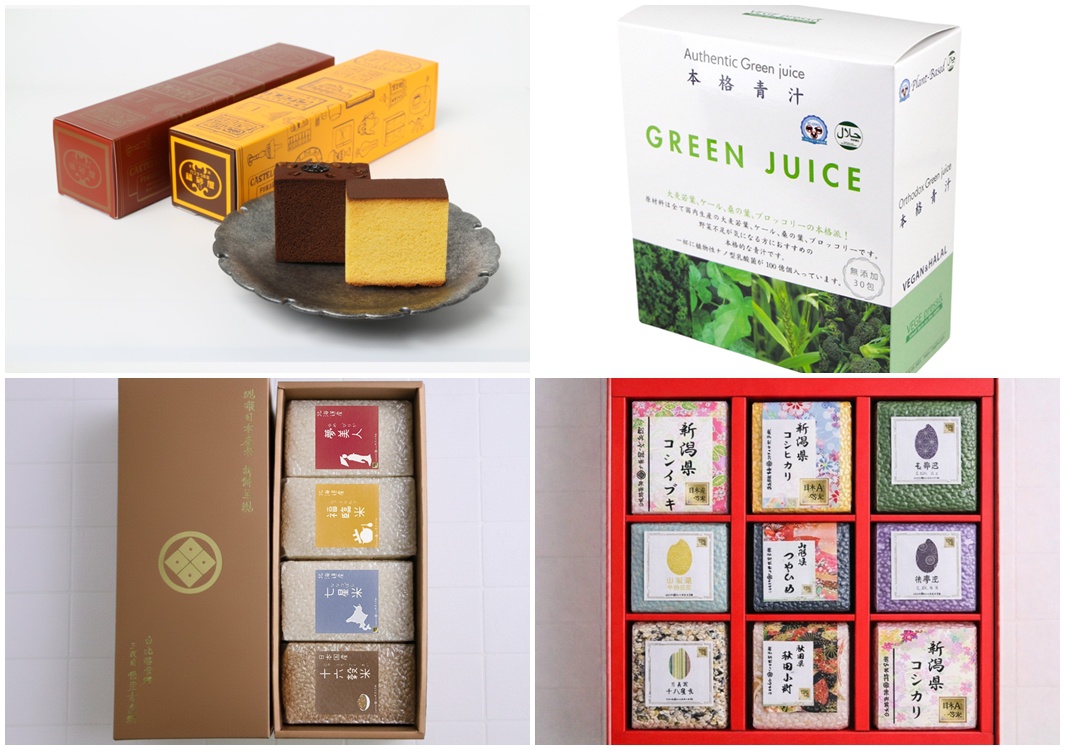 左側為兩個包裝盒，其中一個是紅棕色長方形，另一個是黃色長方形，上面印有圖案和文字，兩盒旁邊放著一塊圓形盤子，盤子上擺放著兩塊方形蛋糕，一塊深棕色，一塊黃色。右側上方是一盒綠色包裝的果汁，上面寫有品牌名稱及多種語言的文字。右側下方是一個紅色禮盒，裡面分隔成九個小格，每個小格裡都放著包裝好的米，米袋上印有各種日文圖案和文字。