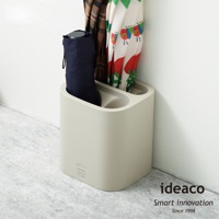 淺灰色簡潔雨傘筒架，具有兩個收納空間，可容納摺疊傘和長傘，材質為塑膠，簡約的設計適合居家玄關擺設。