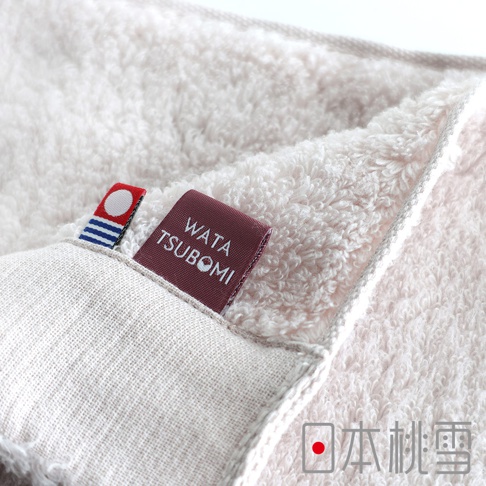 粉色今治毛巾，標有 WATA TSUBOOMI 字樣，右下角有日本桃雪商標。