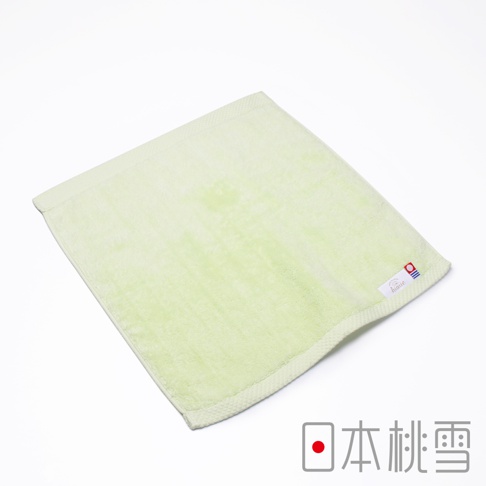 淺綠色今治超長棉方巾，表面有細緻的織紋，右下角有品牌標籤。