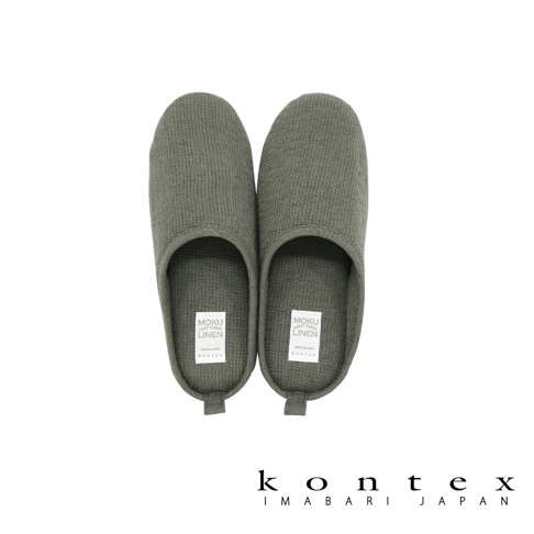 一雙灰色 MOKU 棉麻室內拖鞋，鞋面為羅紋織紋，鞋內標籤顯示「MOKU LIGHT TOWEL LINEN MADE IN JAPAN kontex」。