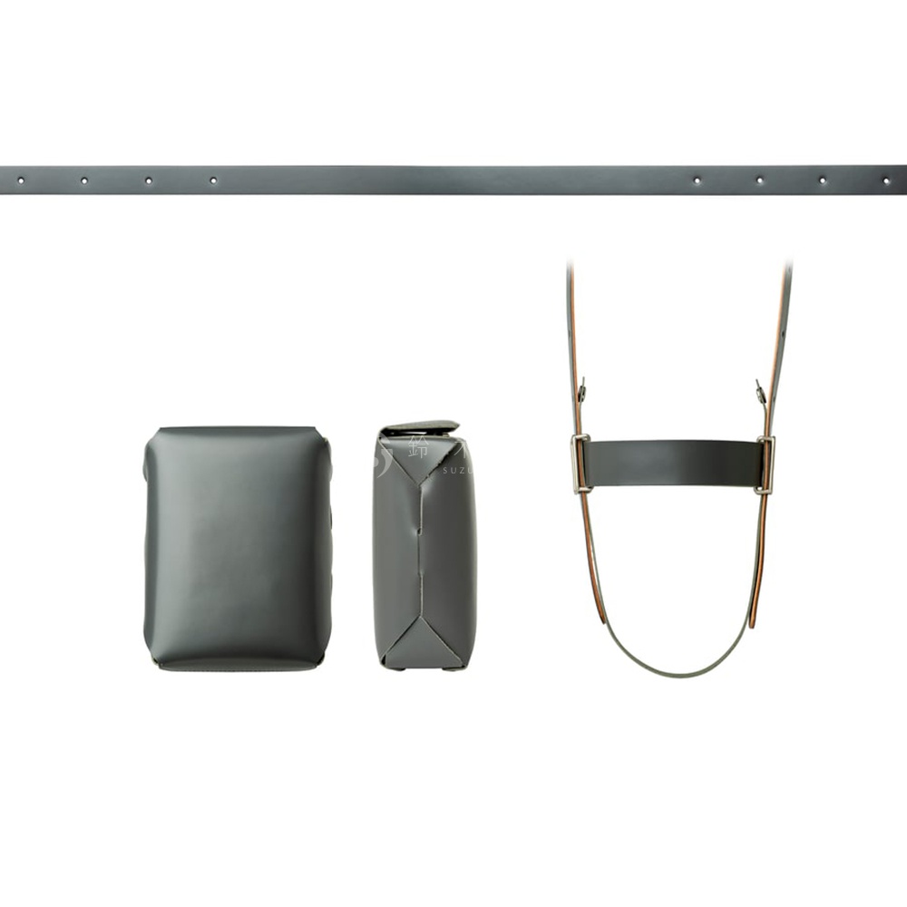 FABRIK 皮革可拆式多用途迷你斜背包，展示其三個組件：一個平坦的長條形皮帶，兩個灰色的小皮包，以及一個由皮帶組成的挽具。