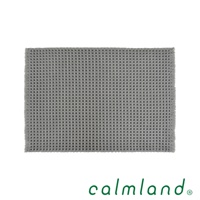 灰色鬆餅紋瞬乾吸水浴墊，織物材質，邊緣帶有流蘇。