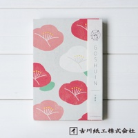 美濃和紙福氣御朱印帳，封面印有粉紅、紅色與白色的山茶花圖案，背景為淺灰色，紙質紋理清晰。右側束帶印有「GOSHÜIN」字樣及日文「つばき」。