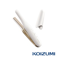 白色珍珠離子夾，帶有金色細節，配有保護蓋。