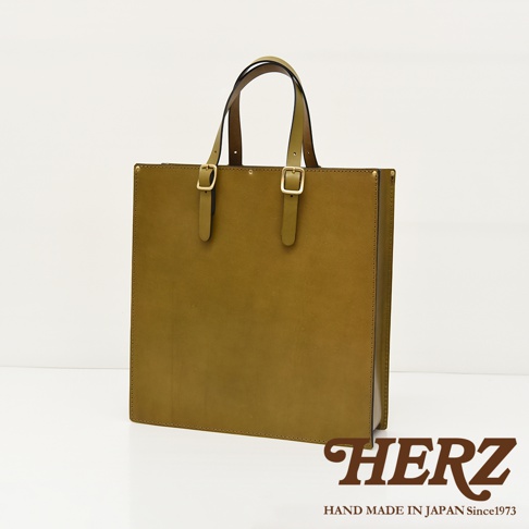 職人手作皮革商務用紙袋托特包，橄欖綠色，方形簡約設計，配有雙皮質提把和金色金屬扣環。