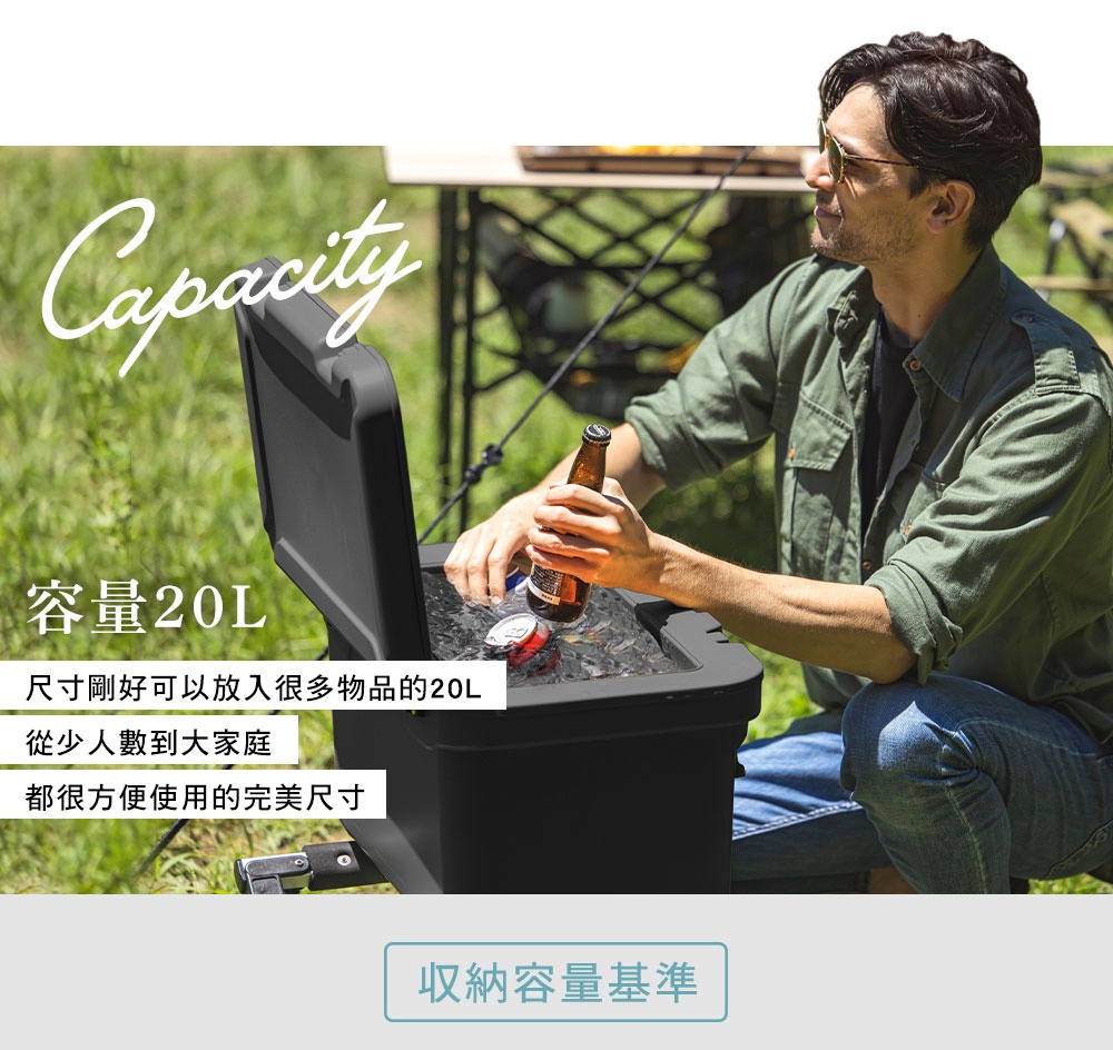 HUGEL 20公升黑色真空隔熱冰桶，蓋子開啟，裝有冰塊和啤酒，一位男子正在取出啤酒。