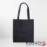 深藍色棉帆布扇形托特包，正面有三條紅色縫線裝飾，配有黑色織帶提把。