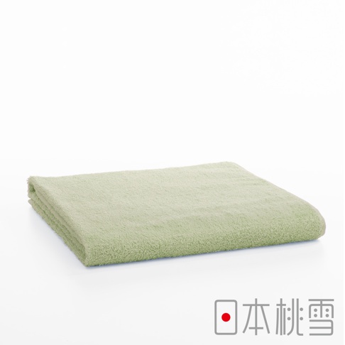 淺綠色飯店大毛巾，材質柔軟，質地蓬鬆，邊緣整齊，產品標示「日本桃雪」。